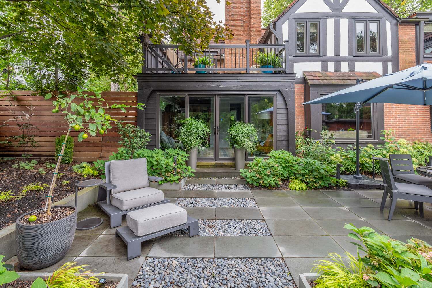 Lush garden beds with colorful seasonal flowers enhancing a backyard in South Russell, OH-1